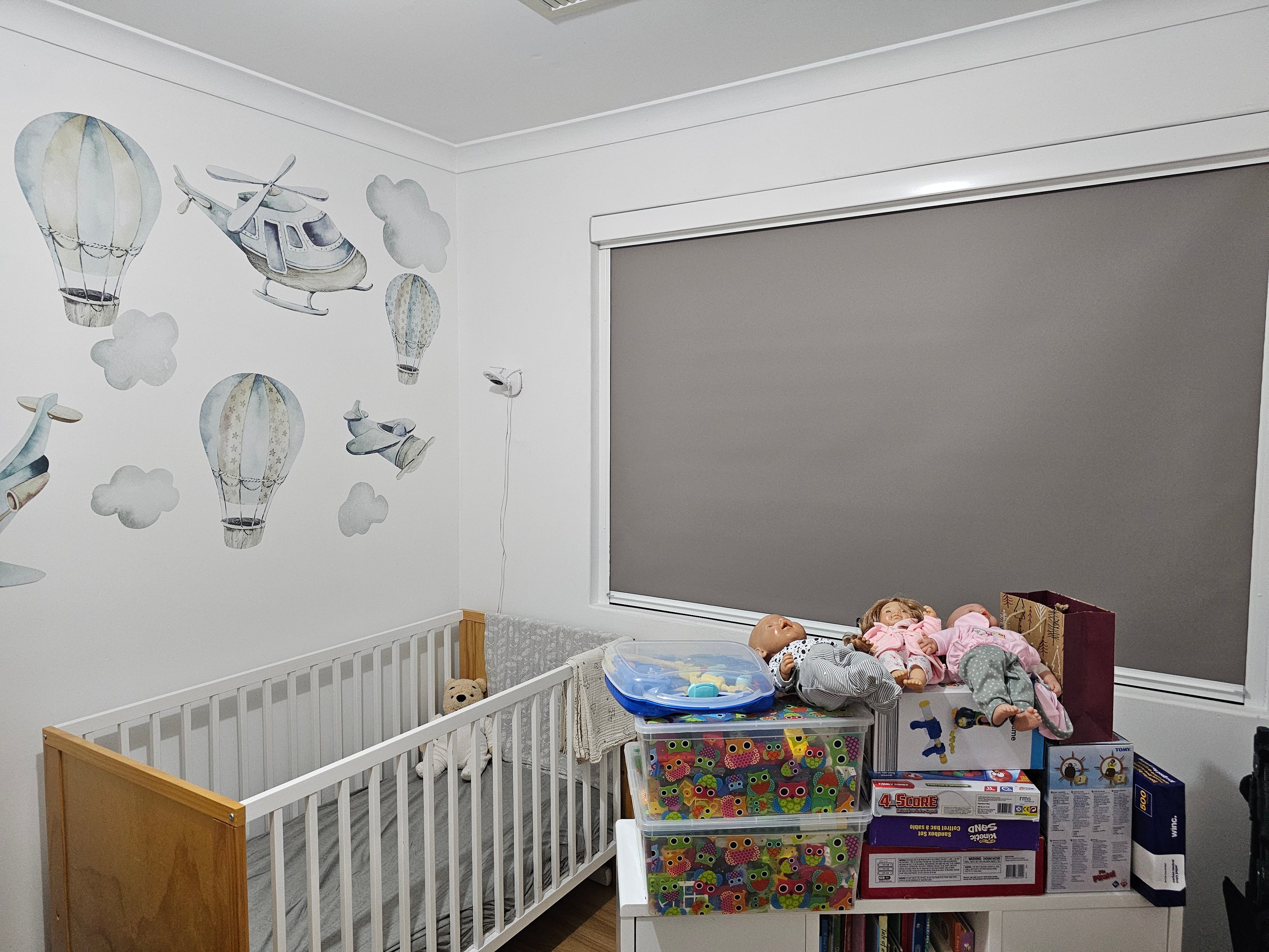 Blackout blind in a baby's nursery brown coloured blinds